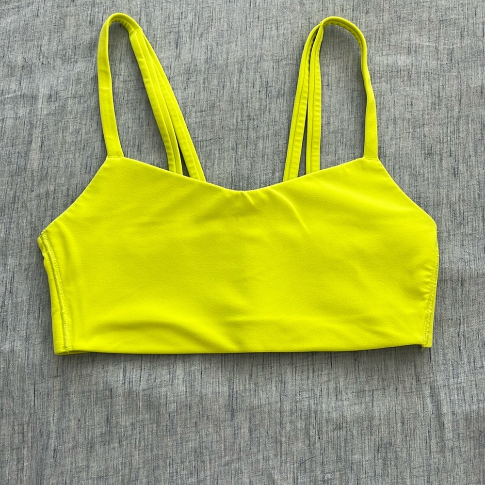 Bright yellow sports bra